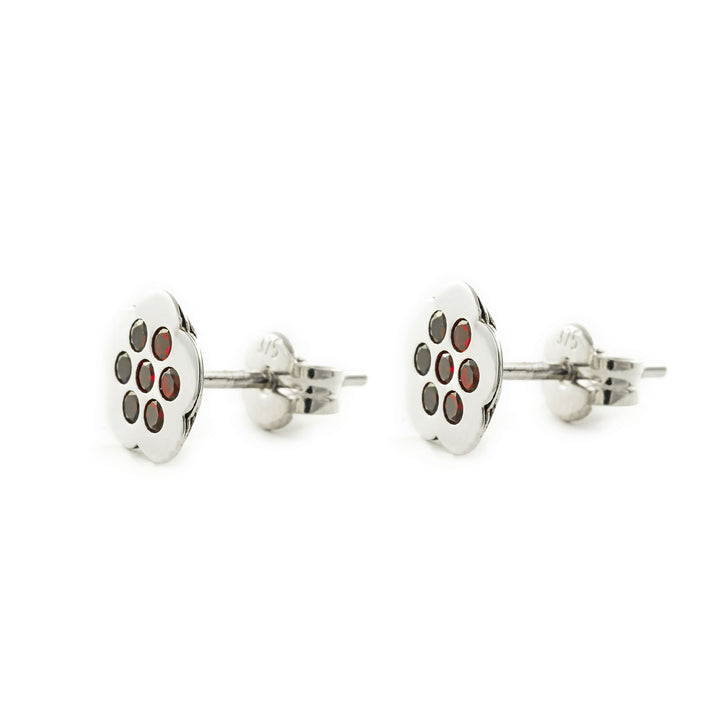 Pendientes oro blanco niña flor multipiedra en color rubí (9kts)