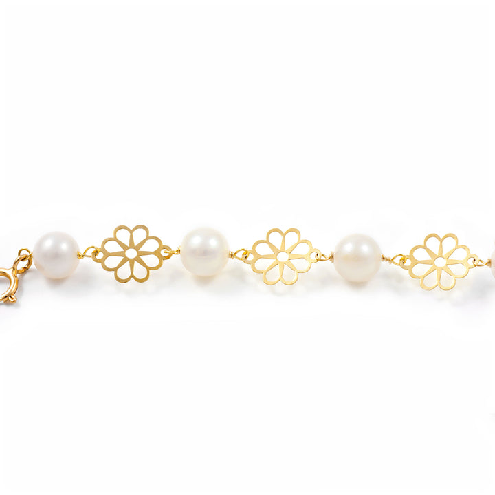 Pulsera Niña oro flor 6 petalos con perlas